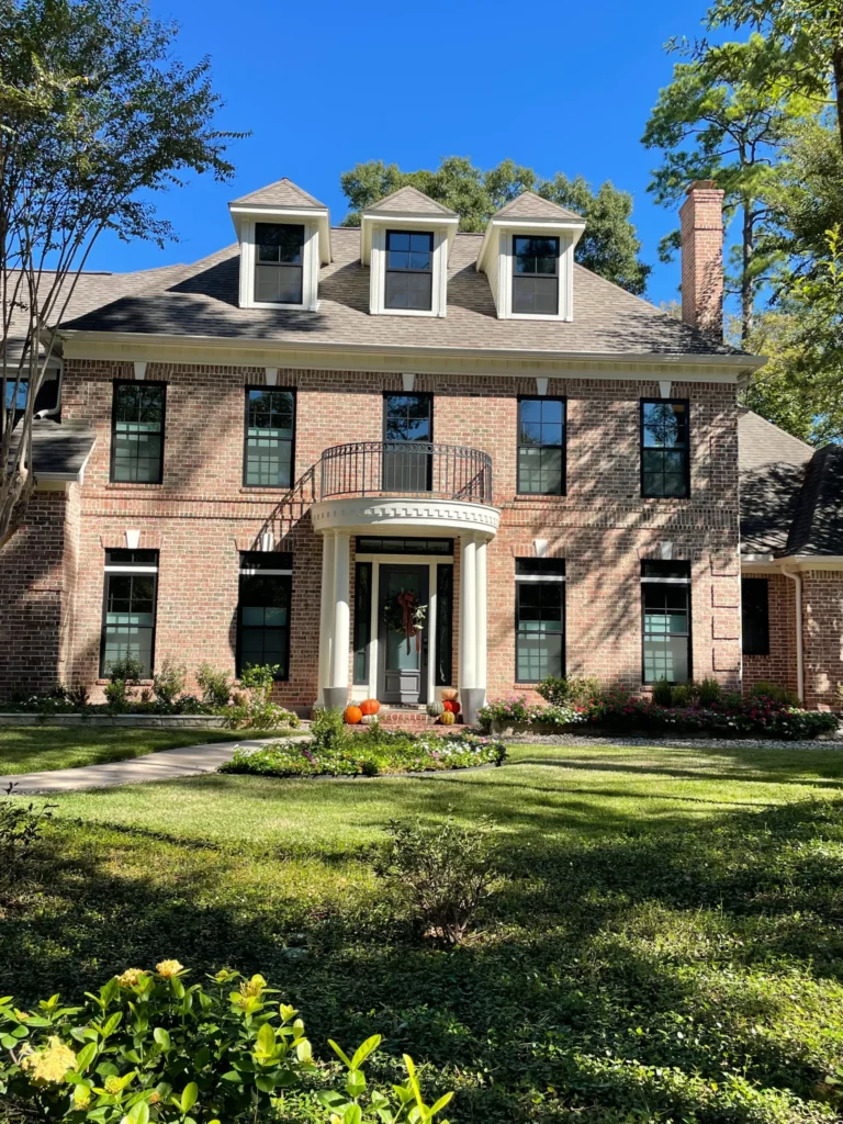 Andersen energy-efficient windows installed by Champion Forest Exteriors on a residential home for improved comfort and curb appeal.
