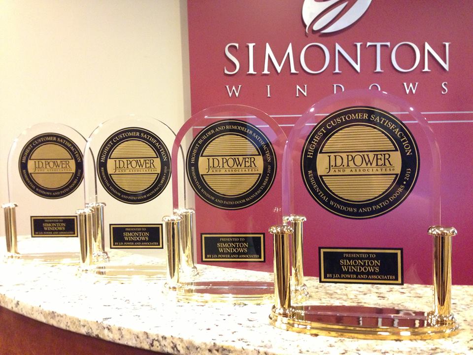 Champion Forest Exteriors installing windows backed by a manufacturer’s limited lifetime warranty and expert workmanship guarantees.