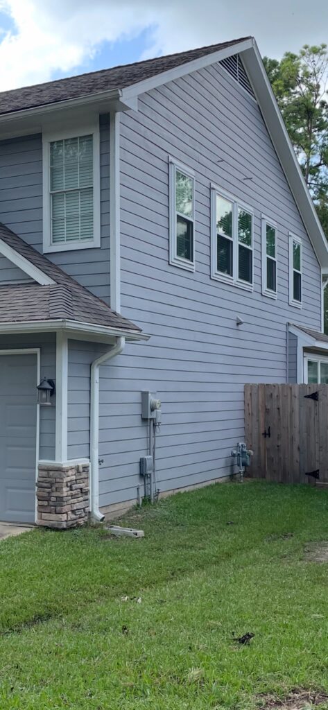 HardiePlank siding installed by Champion Forest Exteriors on a residential home offering lasting protection and a clean modern appearance.