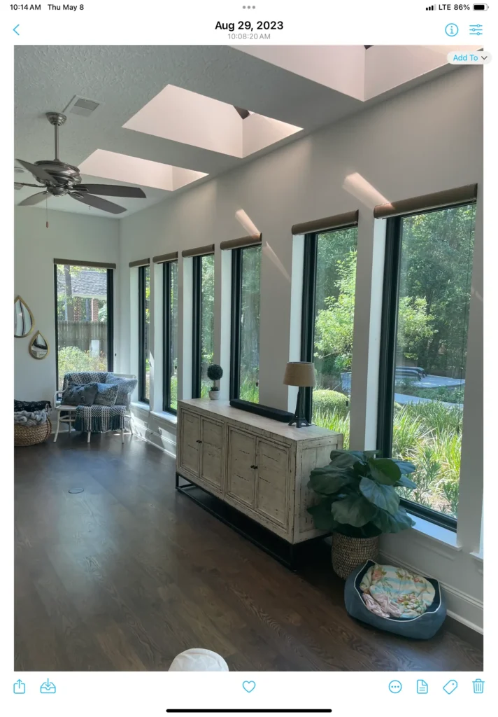 Champion Forest Exteriors consultant walking a homeowner through the exterior remodeling process including product selection and installation timeline.