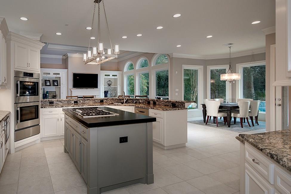 Champion Forest Exteriors installing weather-resistant siding and windows on a Gulf Coast home built to withstand humidity heat and storms.