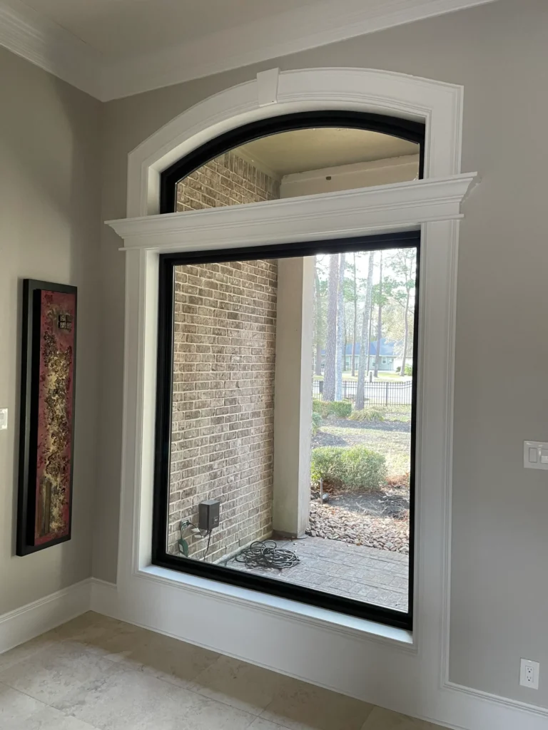 Champion Forest Exteriors showcasing a home with a mix of siding textures and window styles to create a personalized and visually striking exterior.