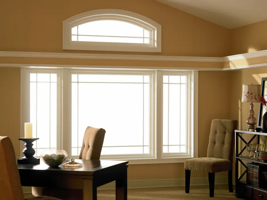 Champion Forest Exteriors crew performing expert installation of siding and windows on a residential home with precision and care.