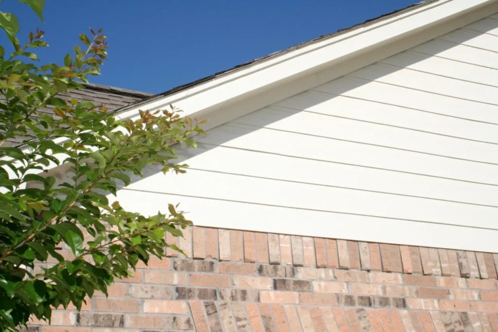 Completed home exterior by Champion Forest Exteriors featuring professionally installed siding covered by trusted manufacturer and workmanship warranties.