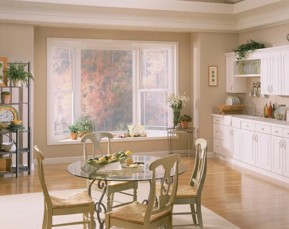 Champion Forest Exteriors expert carefully installing siding on a home to ensure lasting performance energy efficiency and proper fit.