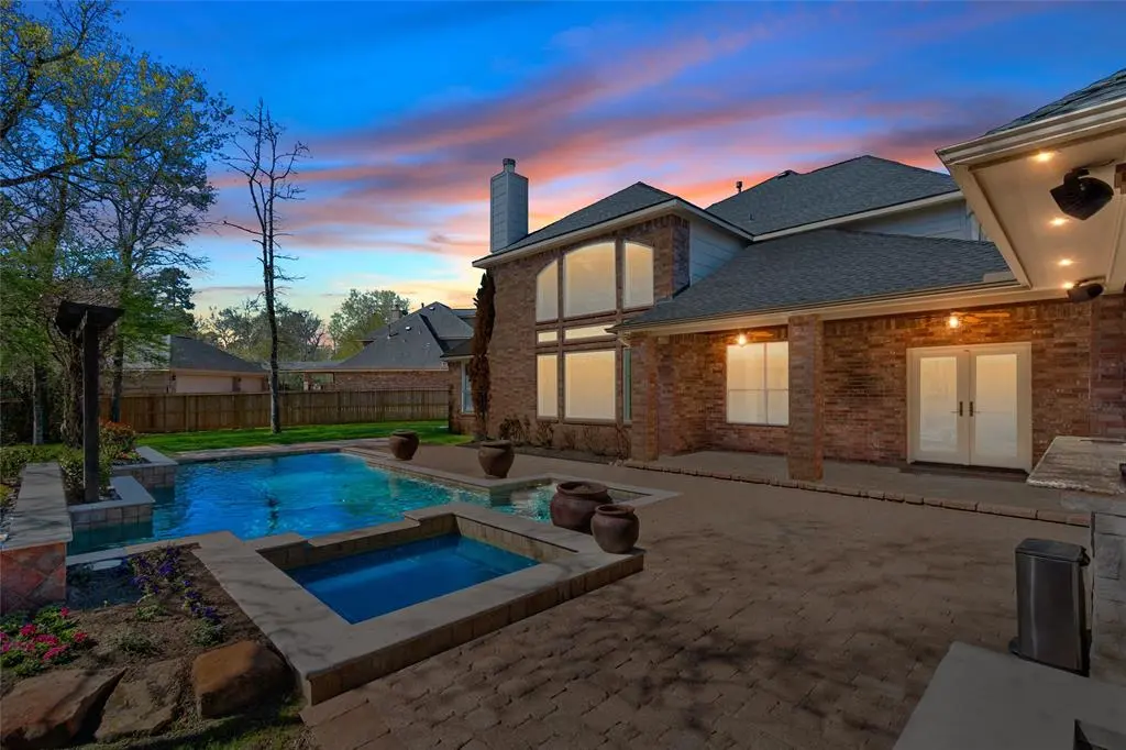 Champion Forest Exteriors team installing new windows siding and roofing on a residential home demonstrating expert local service.